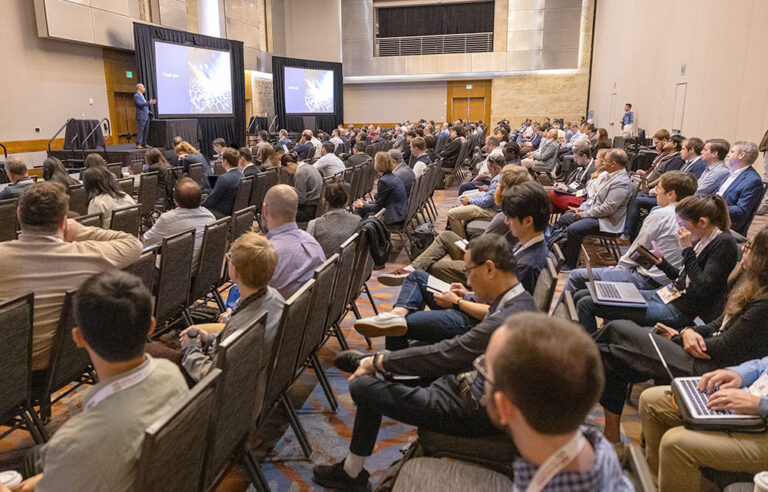Conference Attendees listening to Plenary Speaker